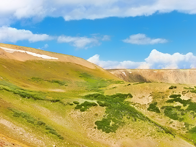 Photograph of eroding Colorado mountains for PeteFree dot com website, illustrating aphorim that "Life grinds our obtuse spots."